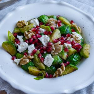 Winter salad with Brussels sprouts, pomegranate and grilled manouri